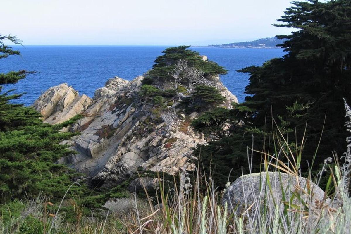 a rocky island in the middle of the ocean