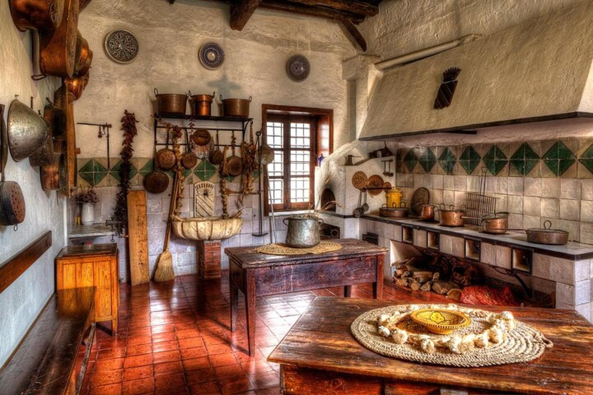 a large kitchen with a table and a stove