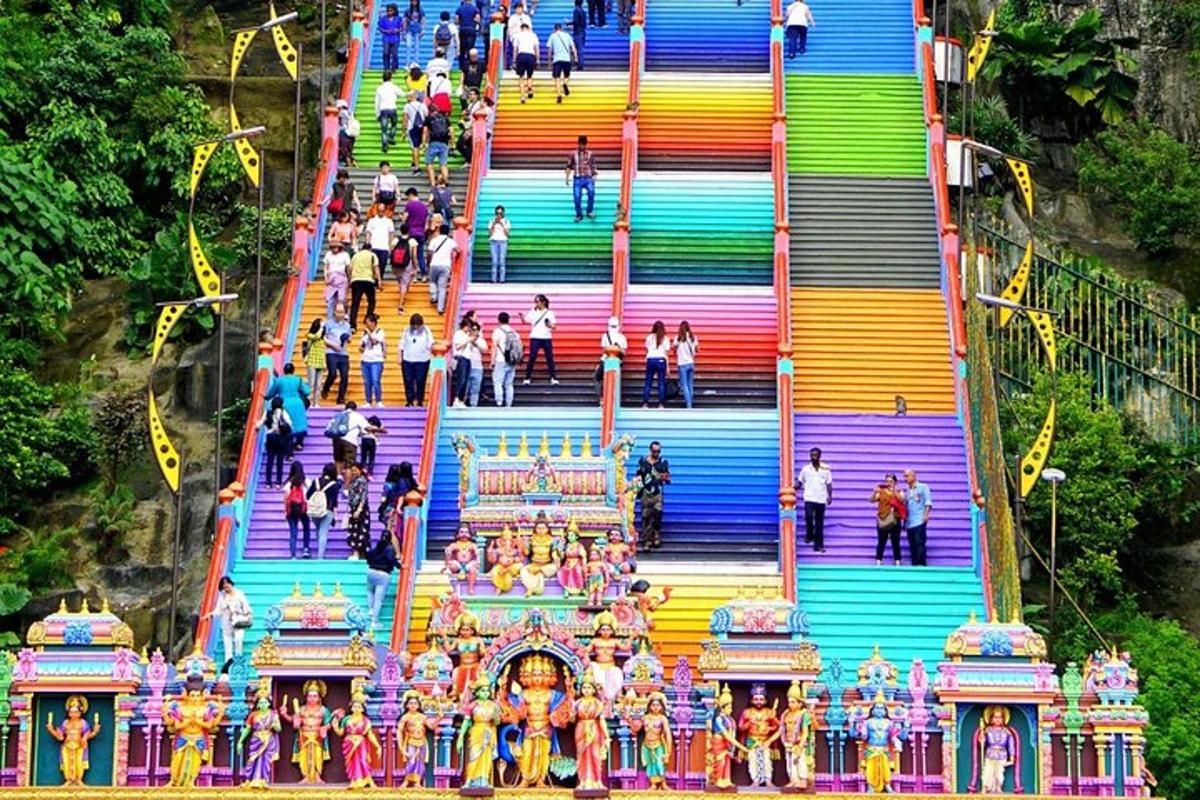 a group of people walking down a colorful staircase