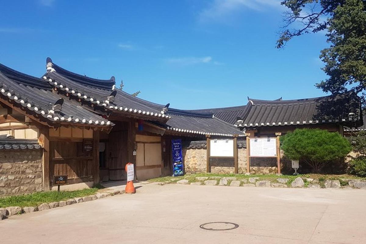 an asian building with a black roof