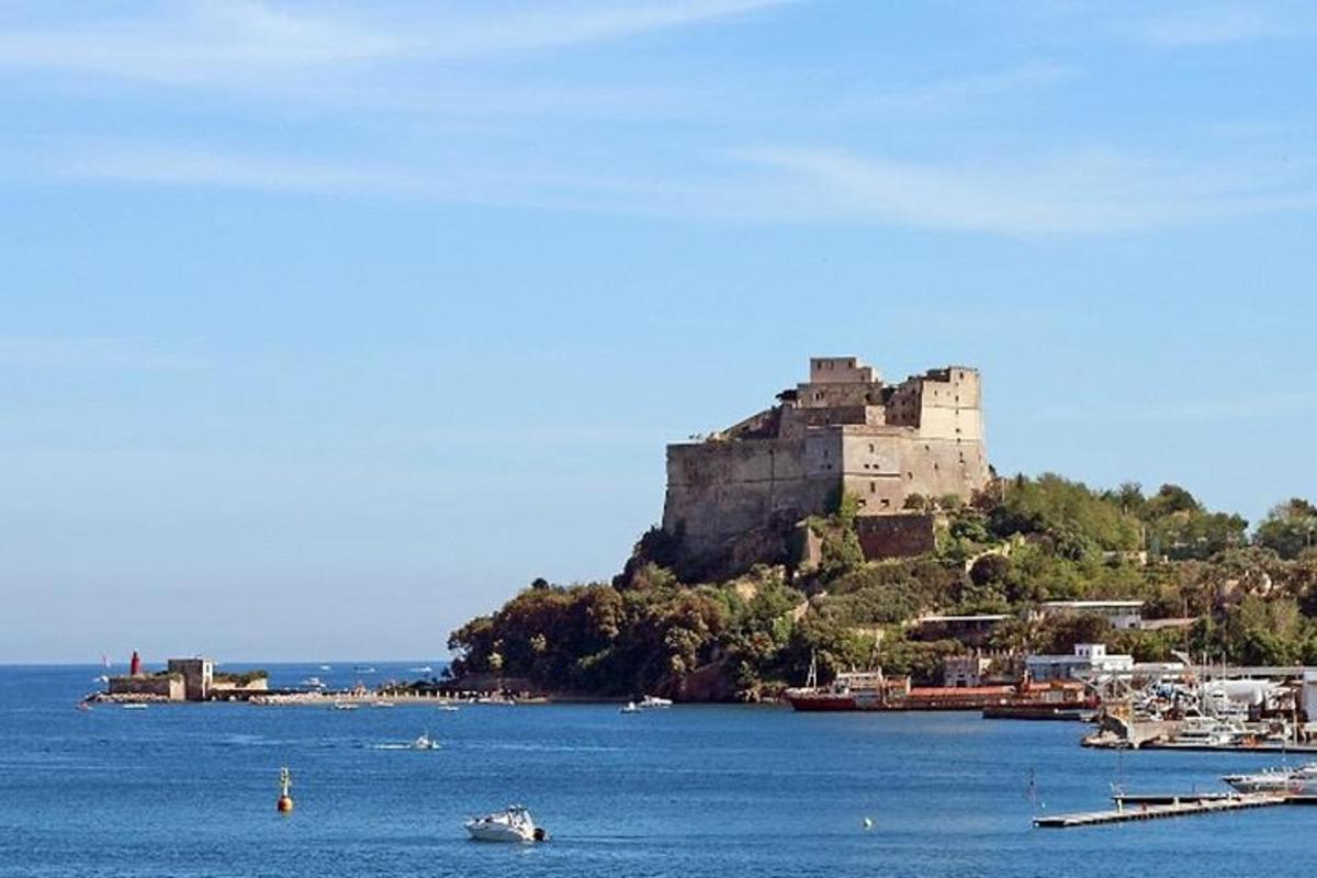 a castle sitting on top of an island in the water