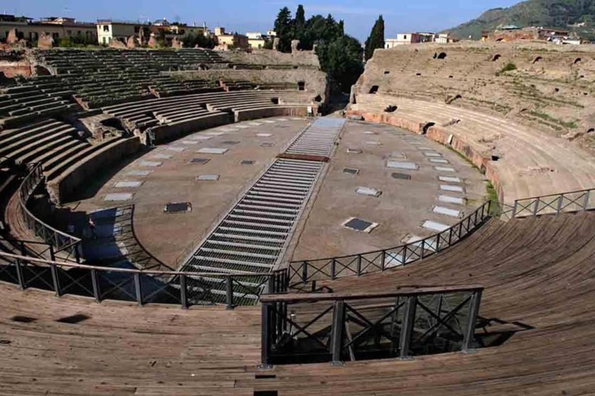 an empty amphitheater with a bunch of seats