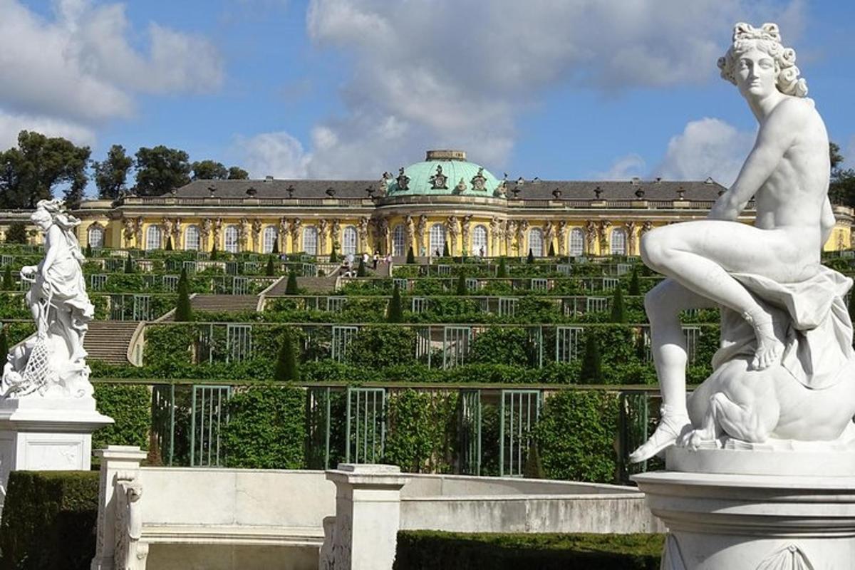 a large building with a statue in front of it