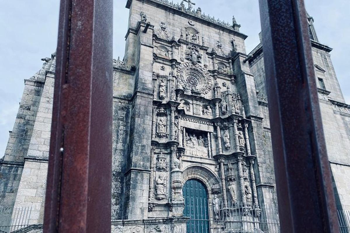 a large stone building with a green door