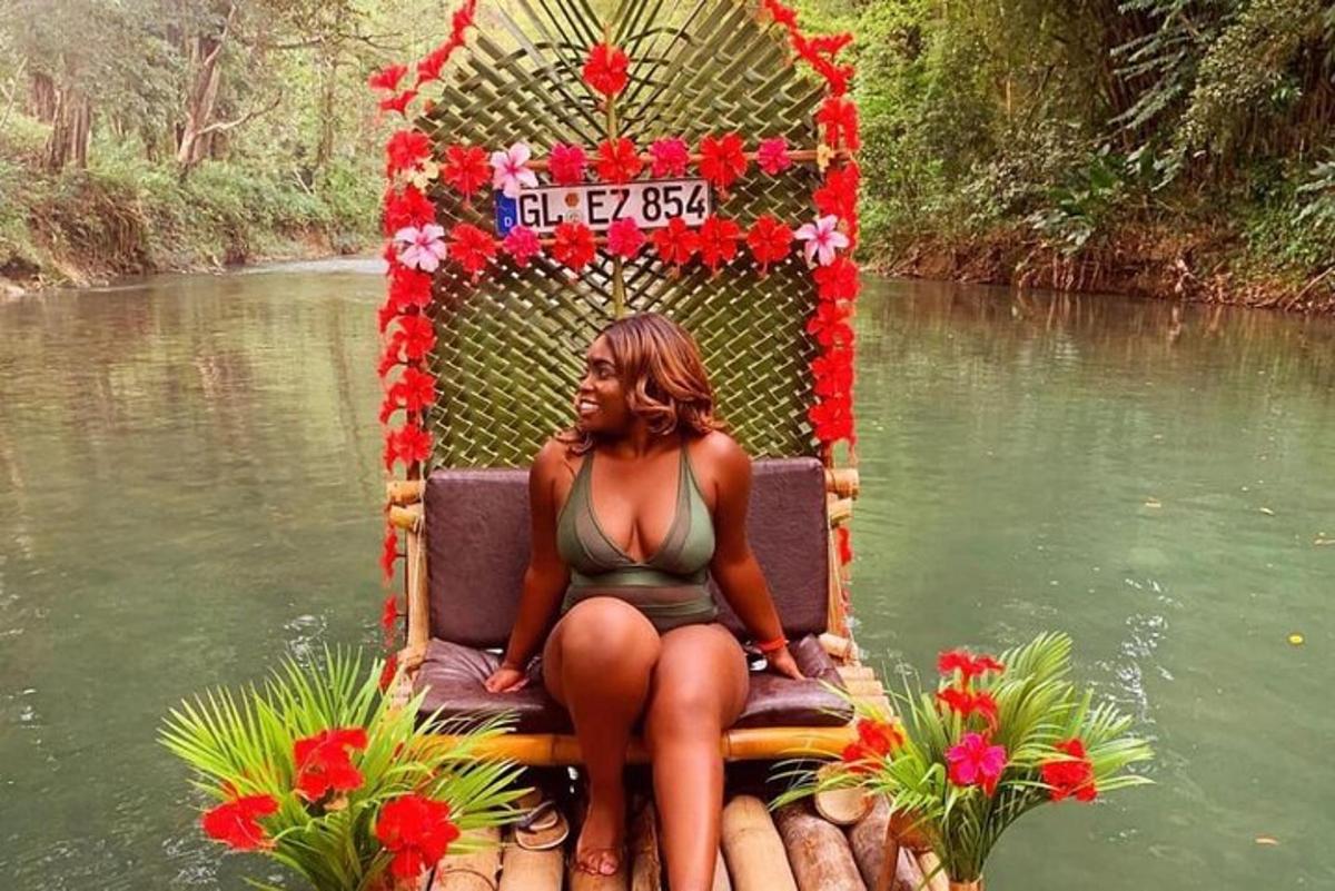 a woman sitting in a chair in the water