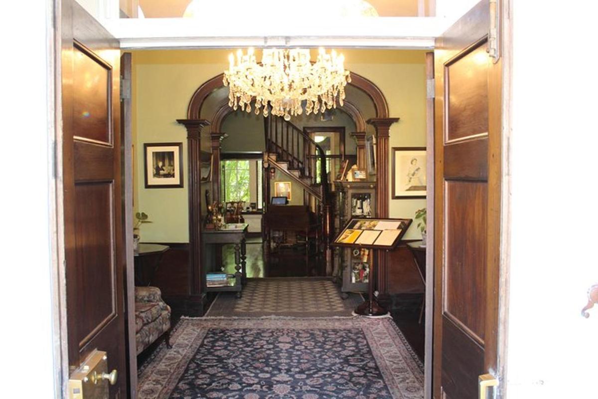 a hallway of a home with a chandelier