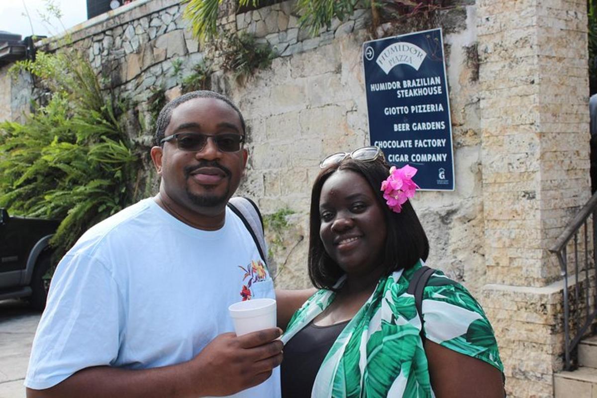 a man and a woman holding a cup of coffee