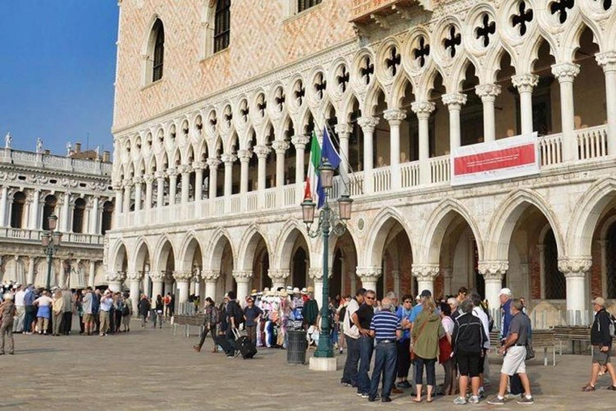 a group of people standing in front of a building
