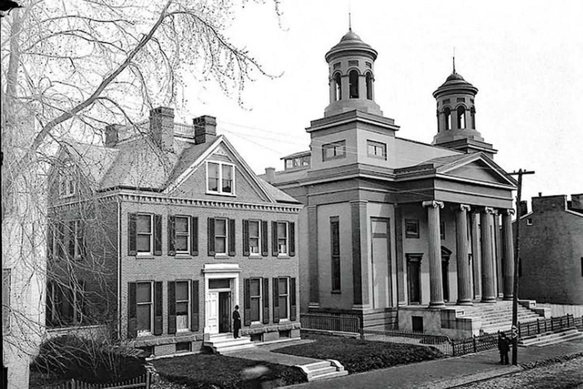 a black and white photo of a large building