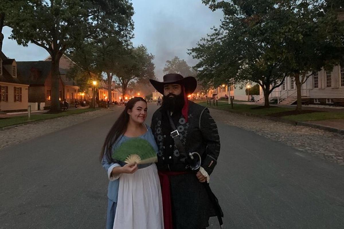 a woman standing next to a man with a beard