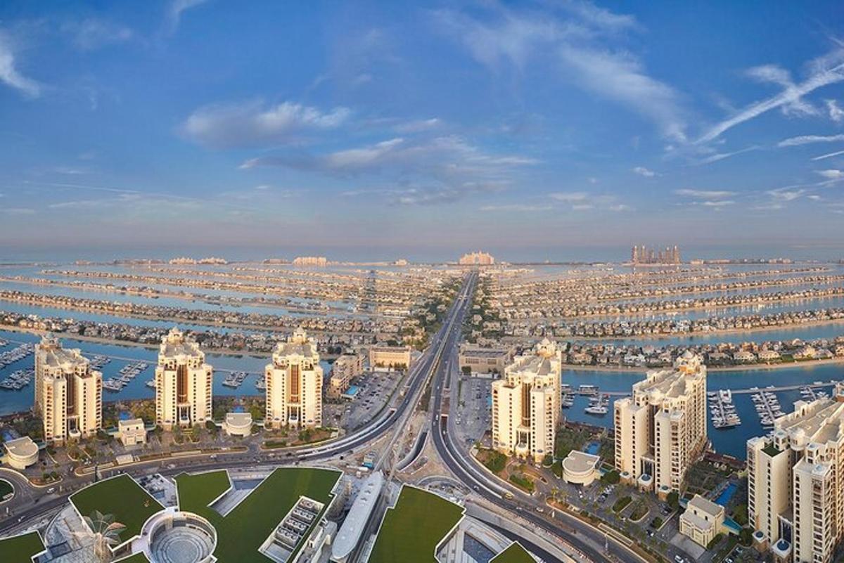 an aerial view of a city with tall buildings