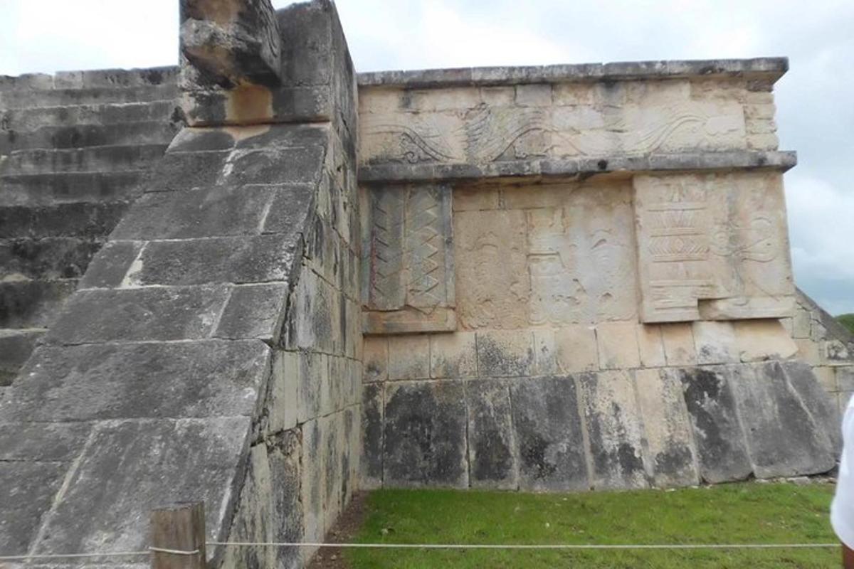 an old stone wall with graffiti on it