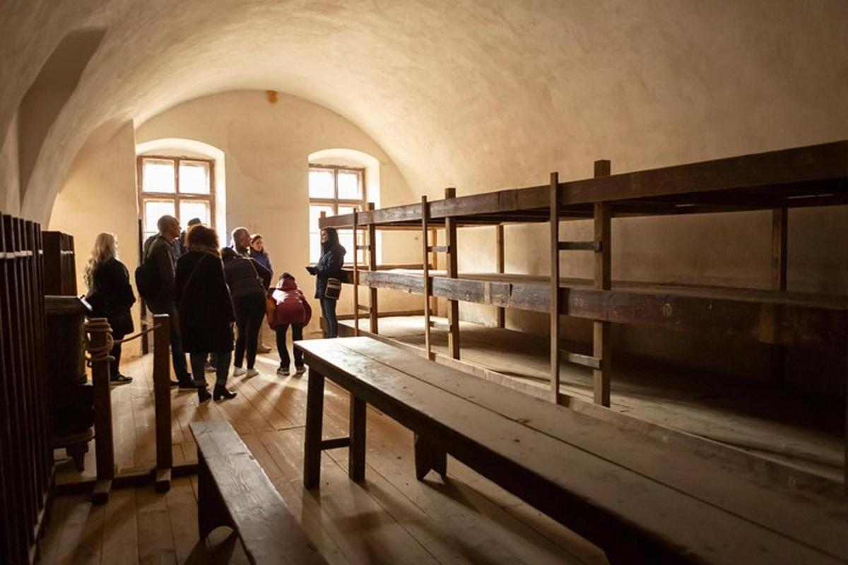 a group of people walking inside of a building