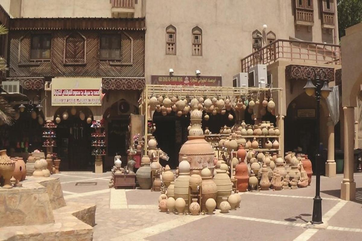 a building with a bunch of pots in front of it