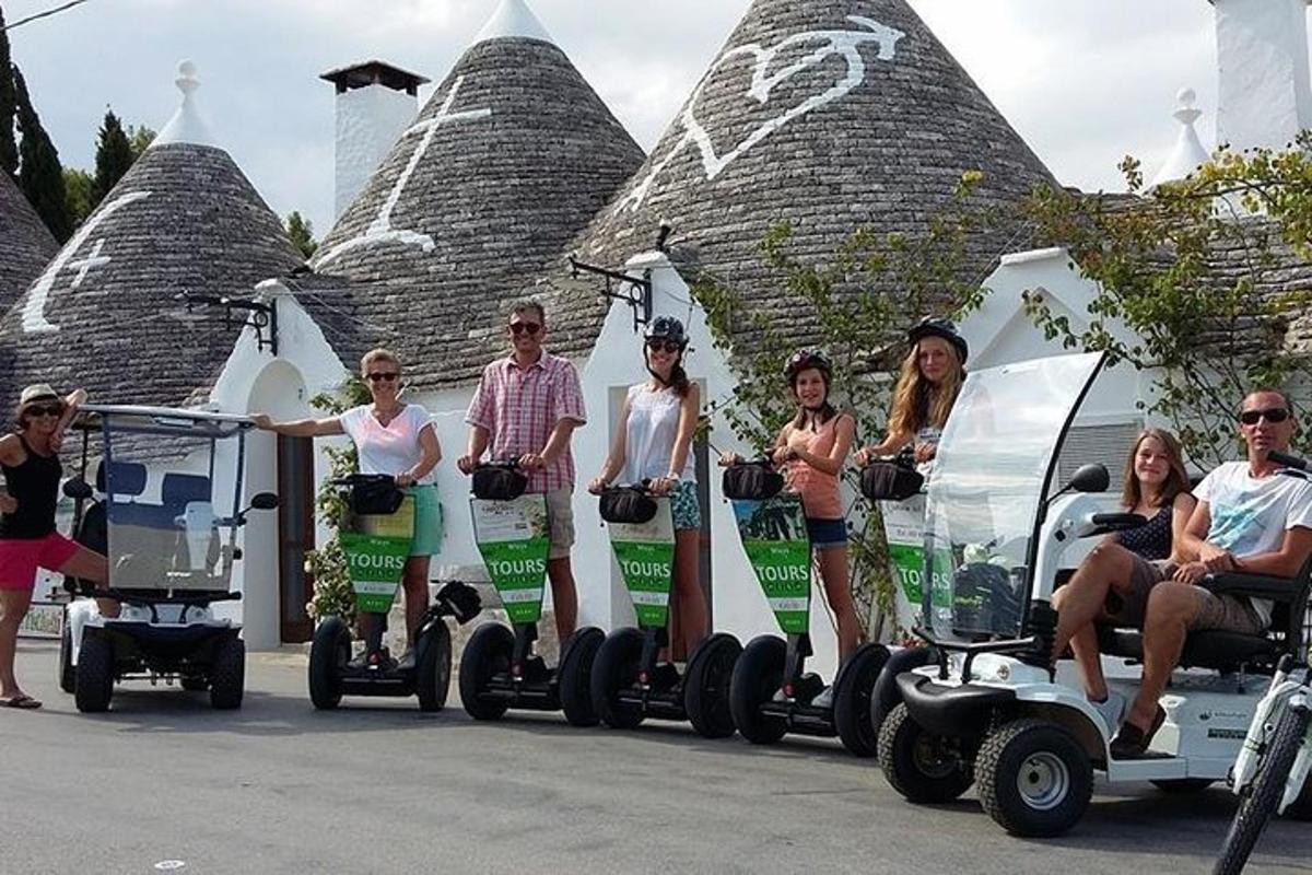 a group of people riding onicycles in front of a building