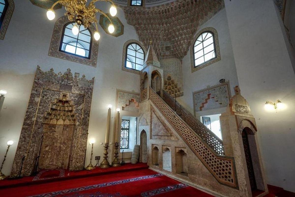 a large room with a staircase in a building