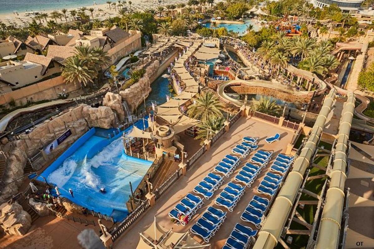 an aerial view of a water park with a pool
