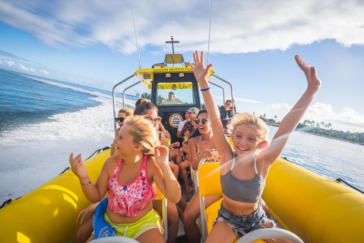 a group of people on a banana boat on the beach