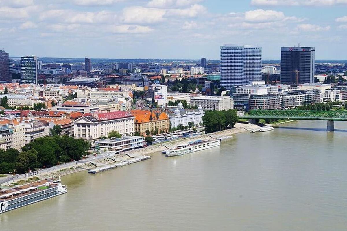 an aerial view of a city with a river