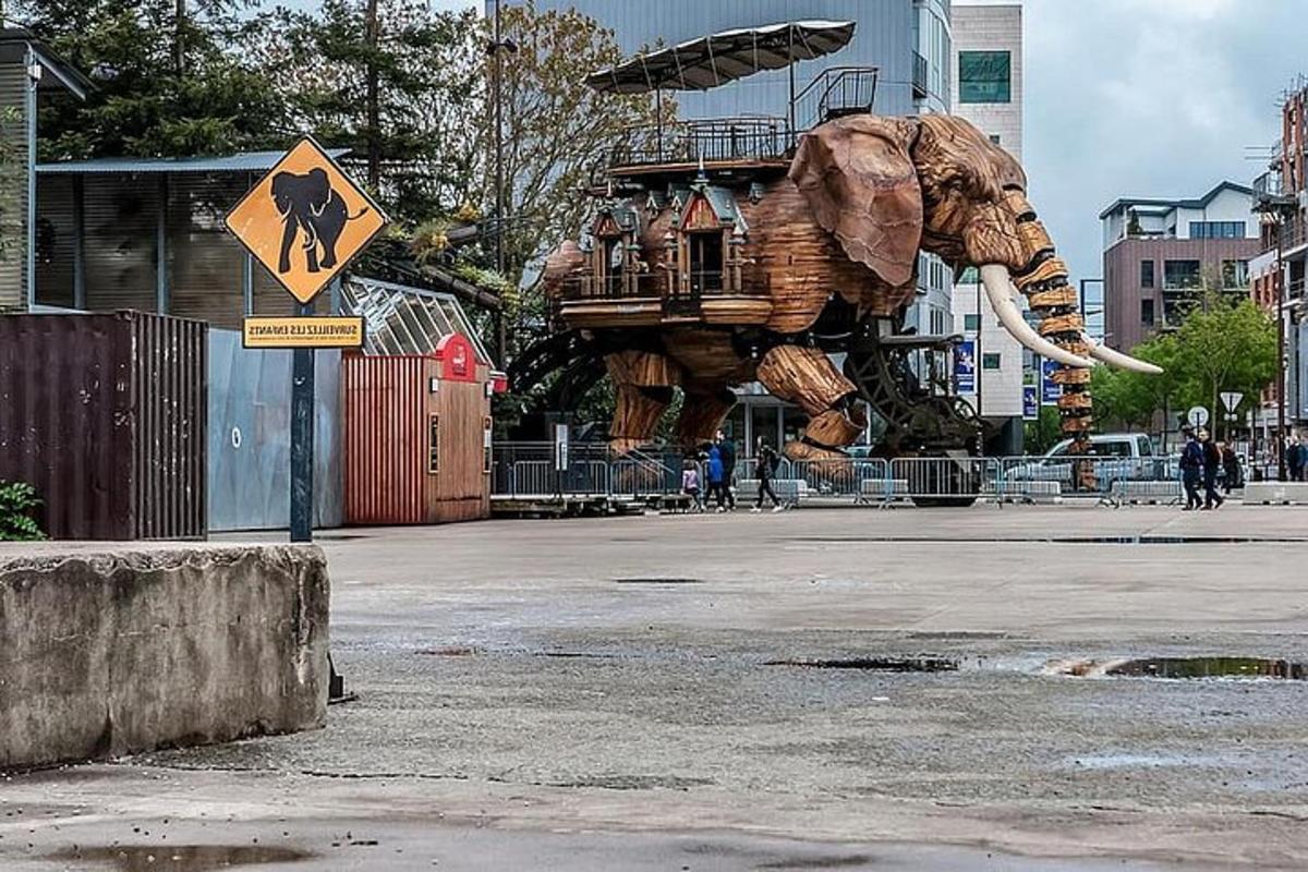 a statue of an elephant in the middle of a street