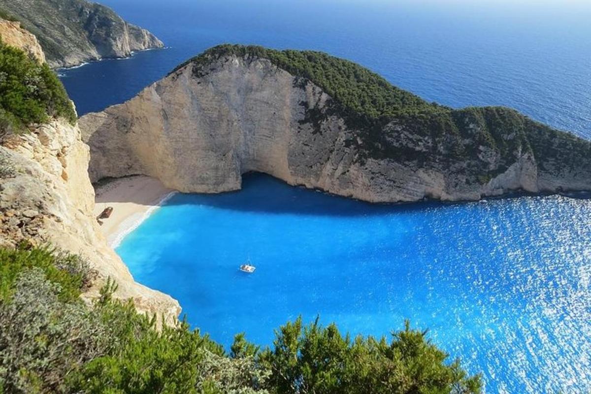 a view of a beach with a boat in the water