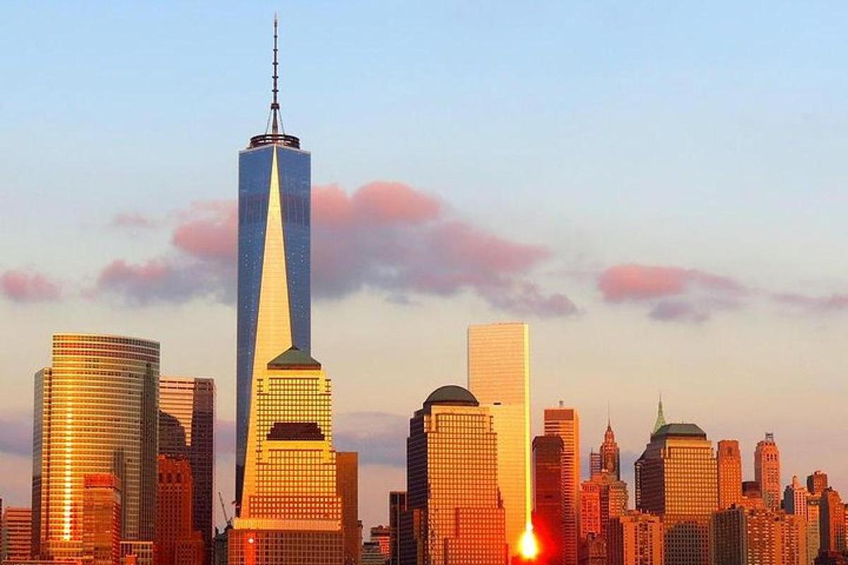 a skyline of a city with a tall skyscraper