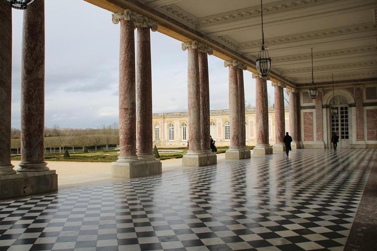 a large building with columns and a checkered floor
