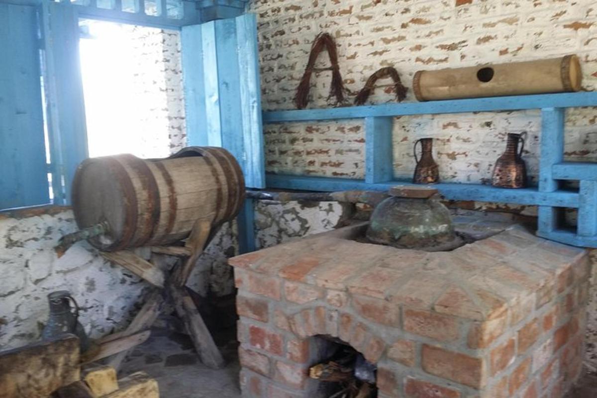 a room with a brick wall and a brick oven