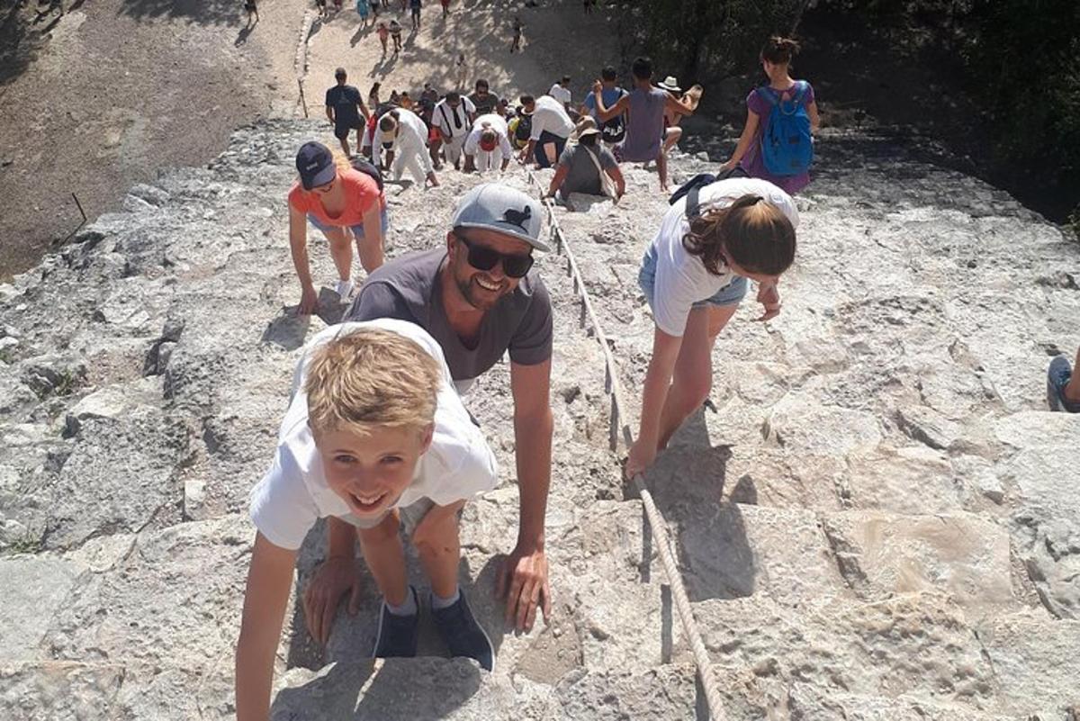 a man and a child on a rocky hill
