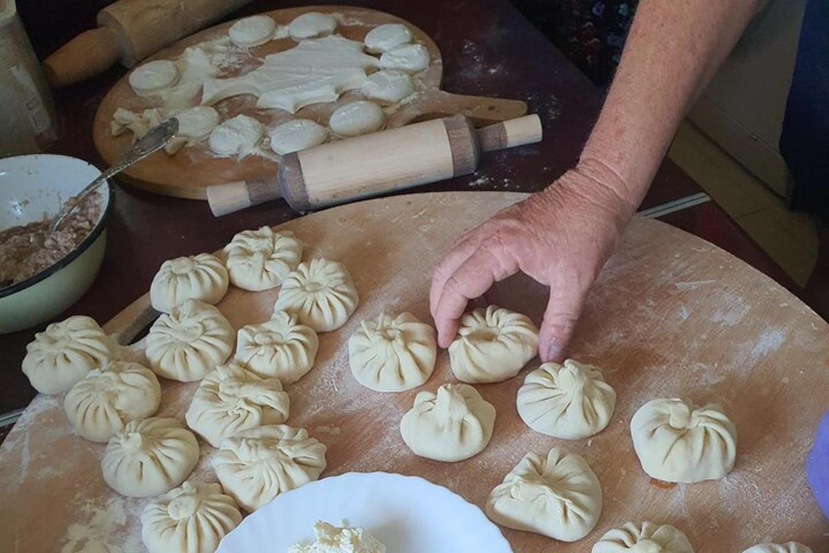 a person is preparing food on a cutting board