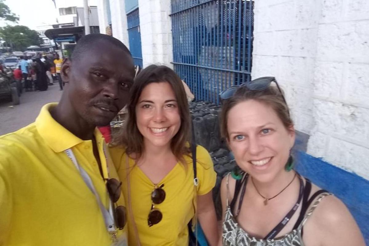 a man and two women posing for a picture