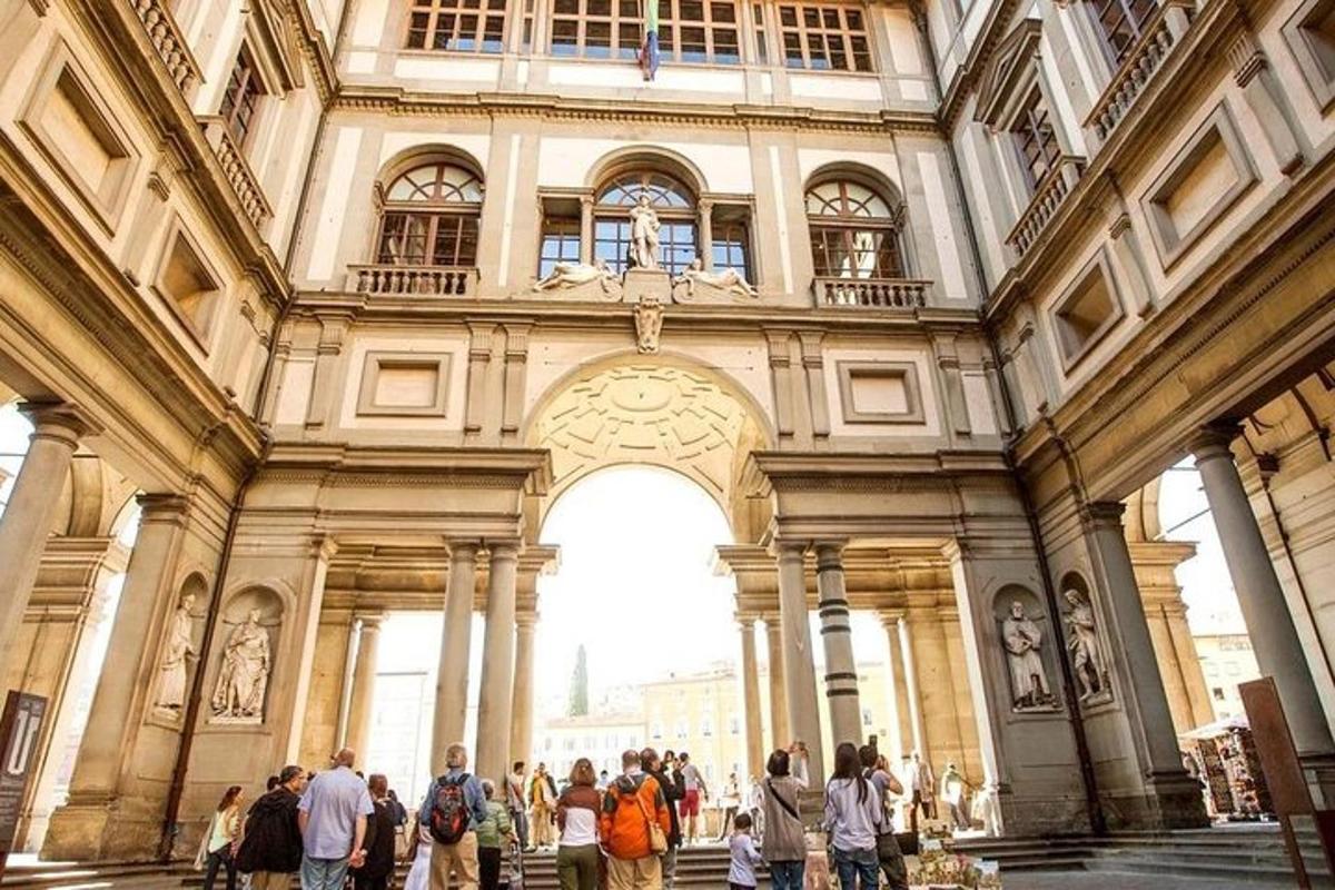 a group of people walking inside of a building