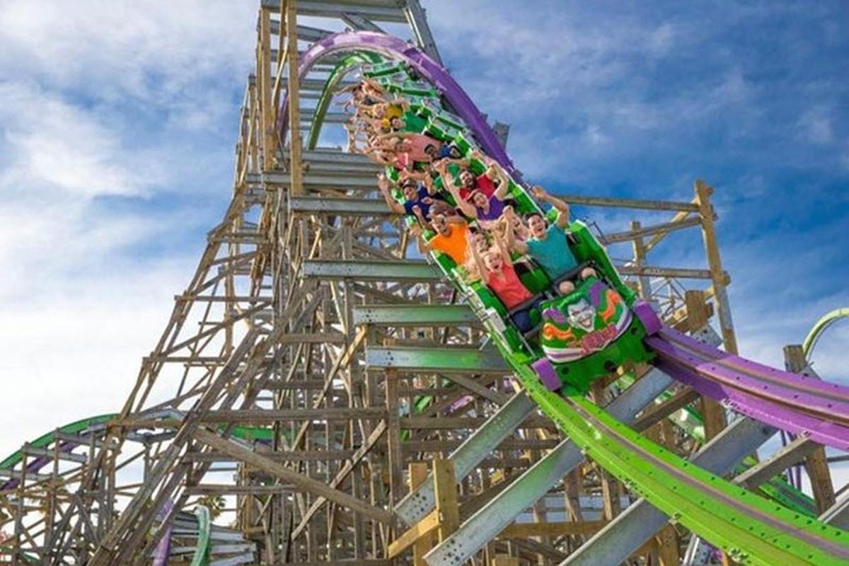 a group of people riding on a roller coaster