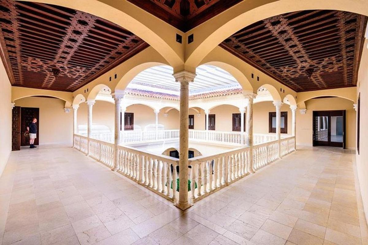 a large hallway with a balcony in a building