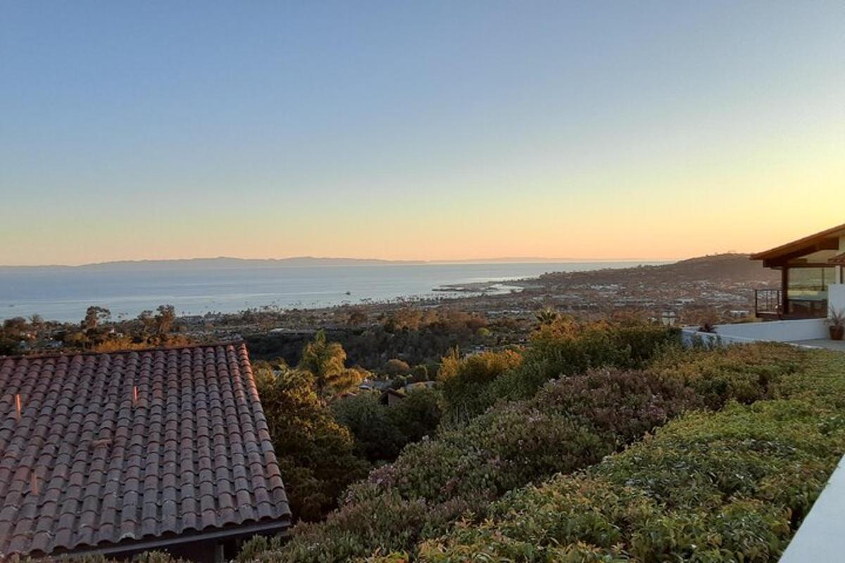 a view of the ocean from a house
