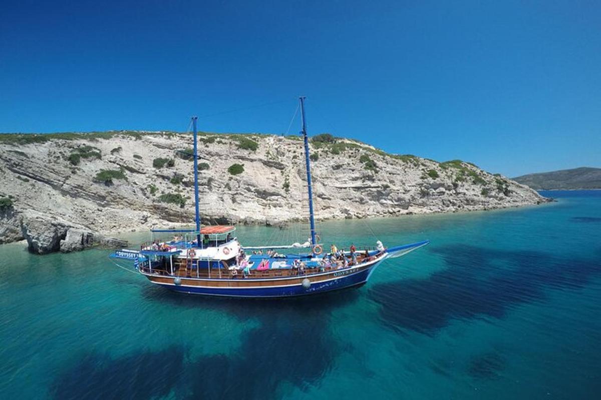 a group of people on a boat in the water