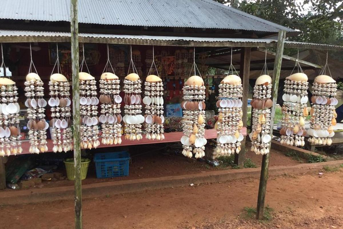 a group of eggs hanging on a display in a store