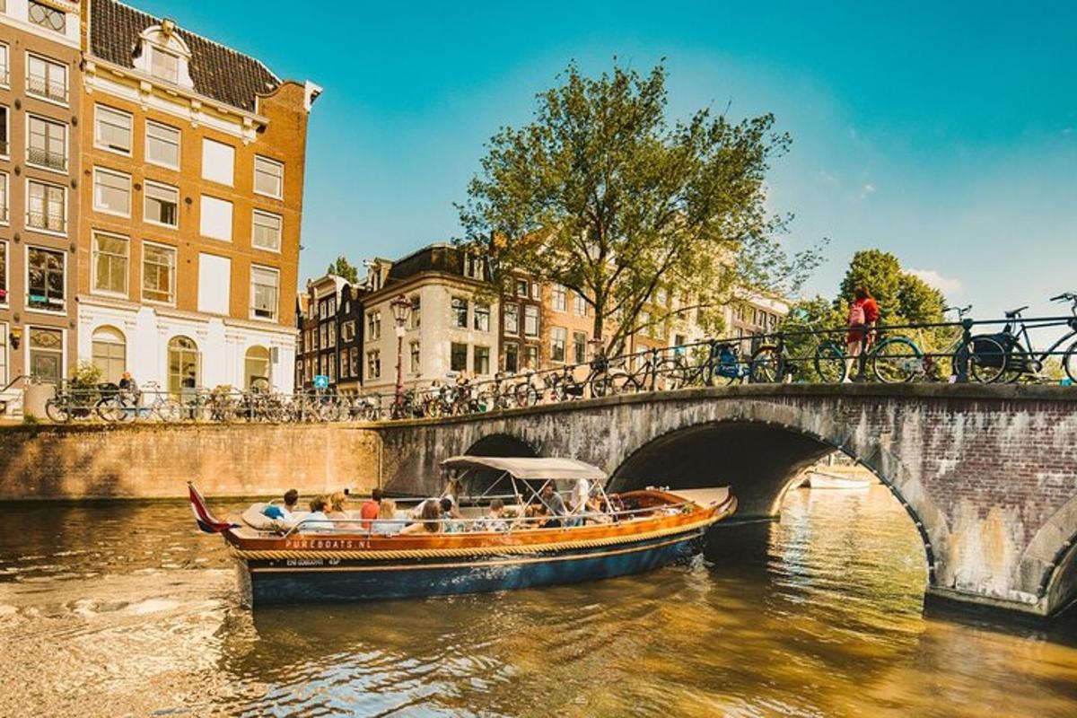 a boat in the water near a bridge