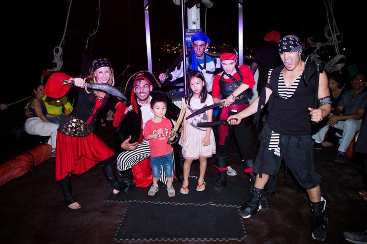 a group of people dressed in costumes posing for a picture
