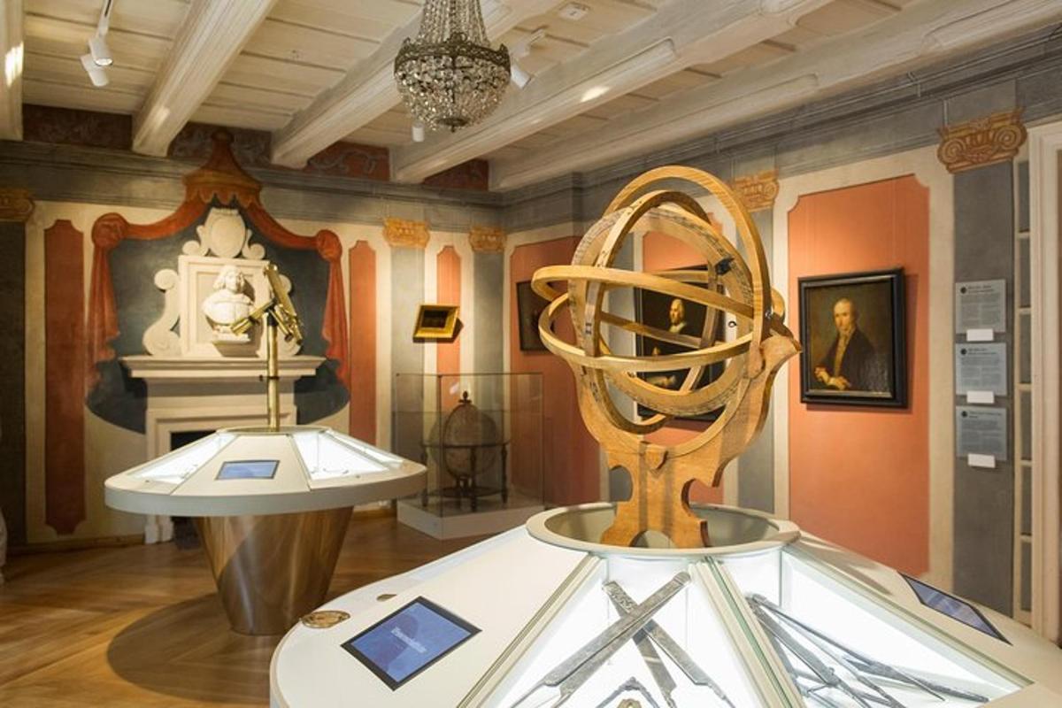 a museum with a sculpture in the middle of a room