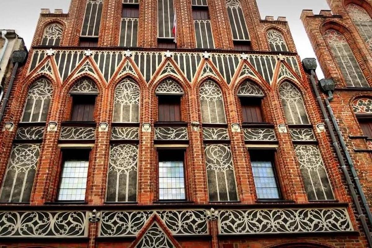 a tall brick building with lots of windows