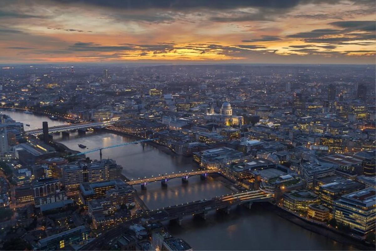 an aerial view of a city with a river