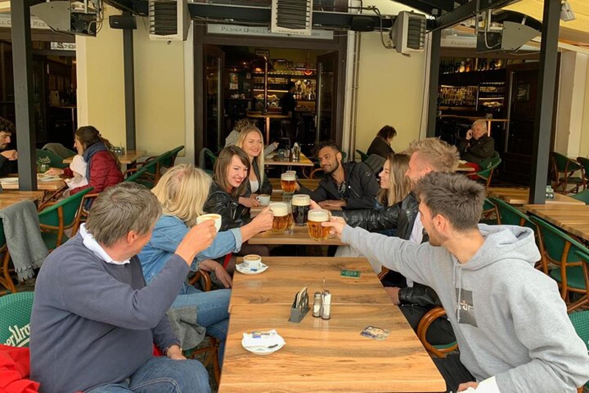 a group of people sitting around a table eating