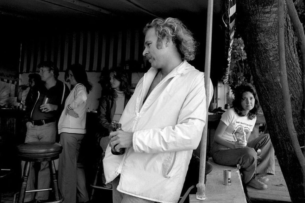 a man standing in front of a group of people