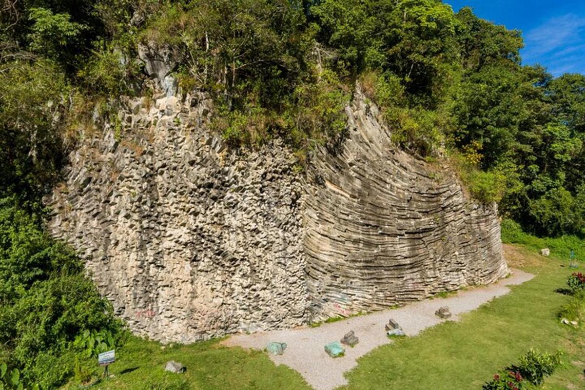 an aerial view of a large rock cliff