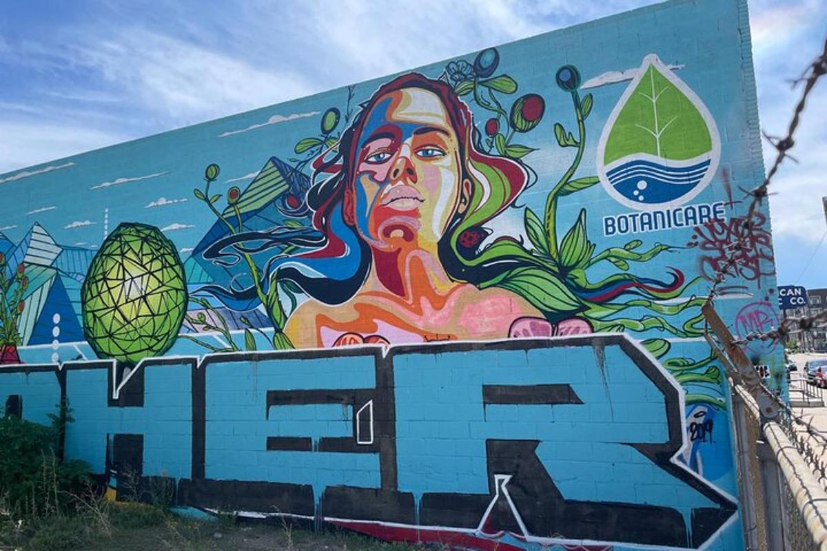a mural of a woman on the side of a building