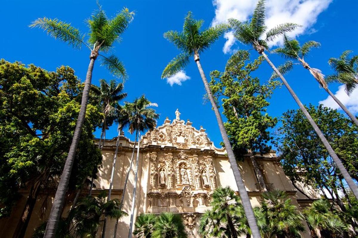 a building with palm trees in front of it