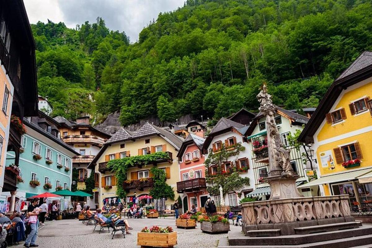 a group of buildings in a town with trees