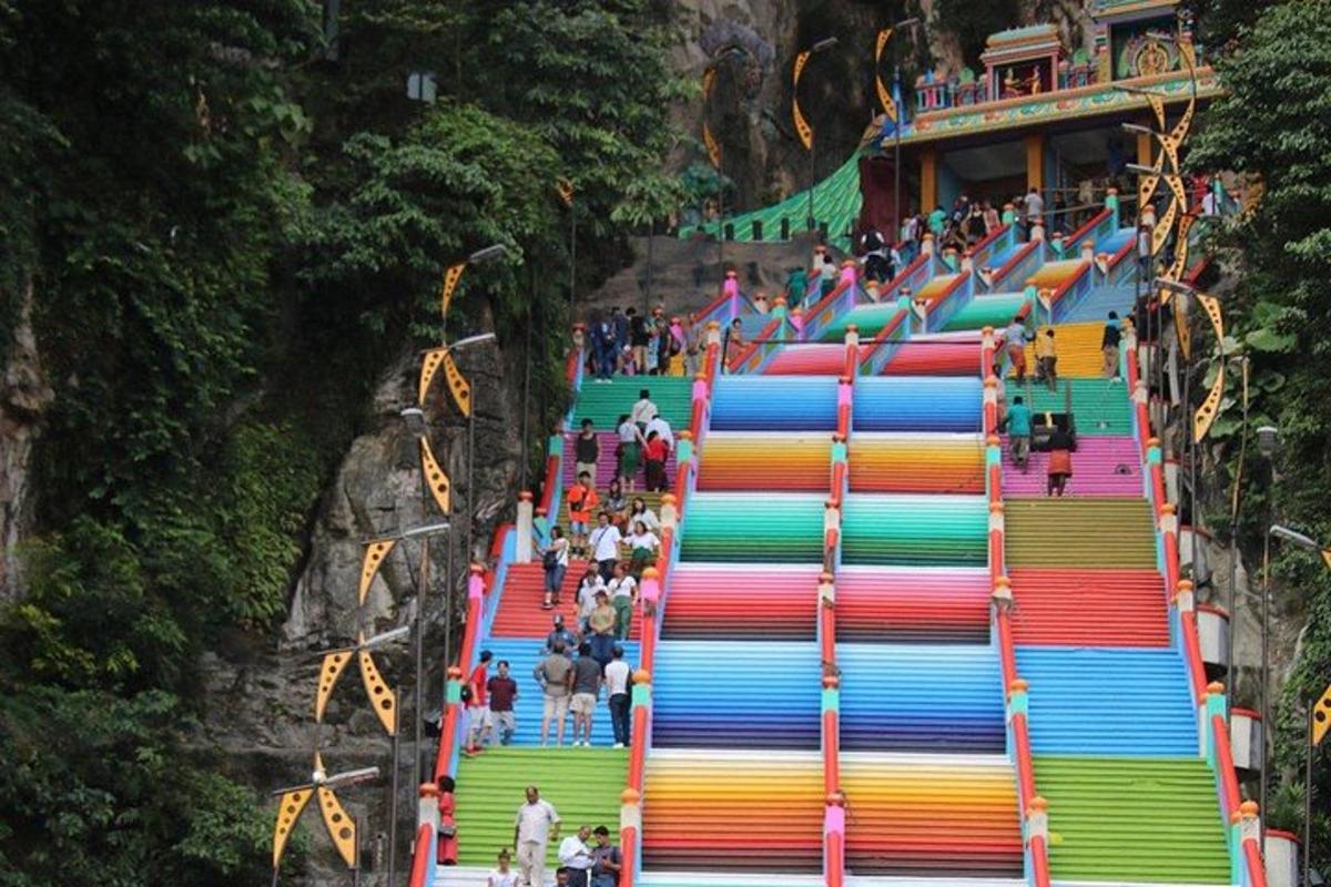 a group of people walking down a colorful stairway
