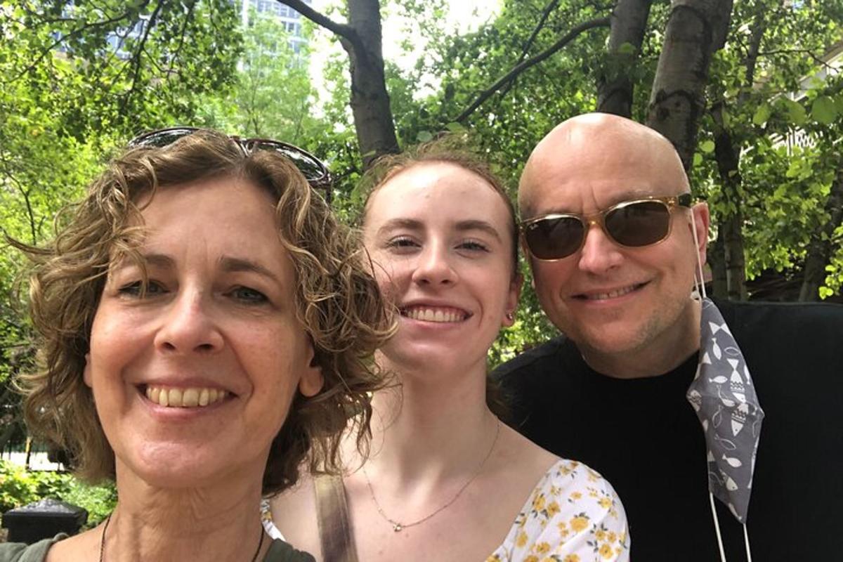 a man and two women posing for a picture